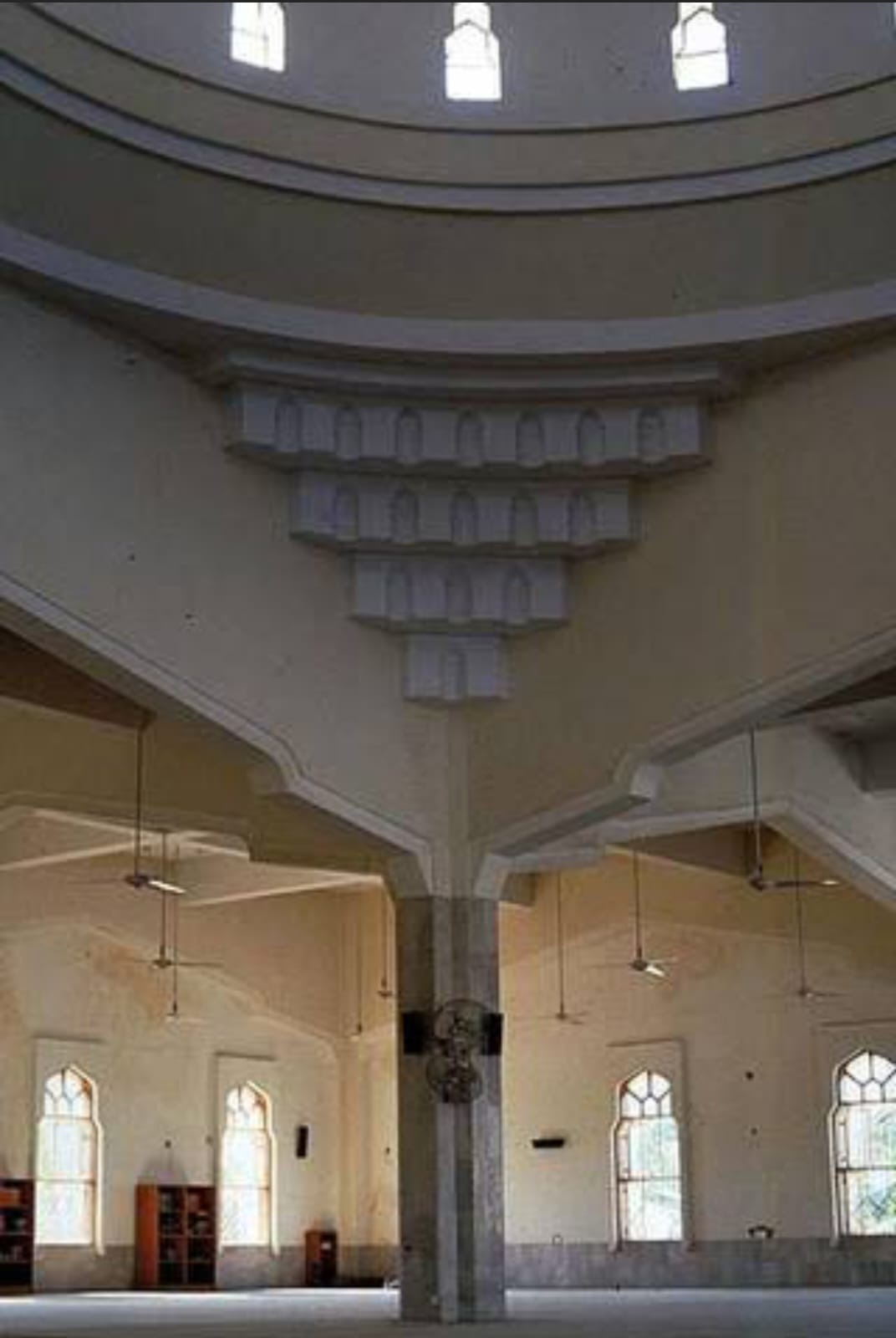 Interior of Bait ul Mukarram — the central column rising to the dome, ornate plasterwork, arched windows, early photograph